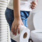asian boy sitting toilet bowl holding tissue paper health problem concept 1 85x85